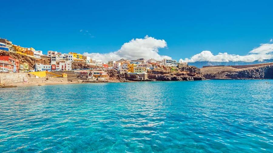 View of blue sea and surrounding town in the Canary Islands town