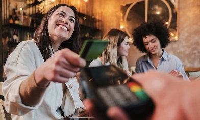 lady making a payment with her card