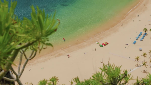 cliff top view of a sunny beach