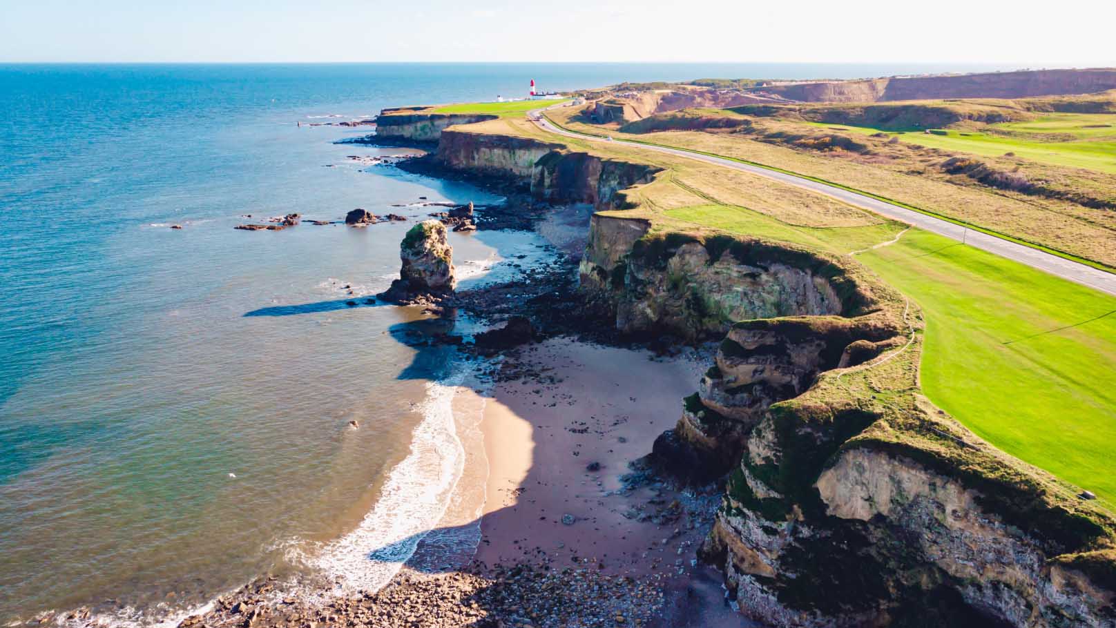 aerial view of cliffs overlooking the shoreline